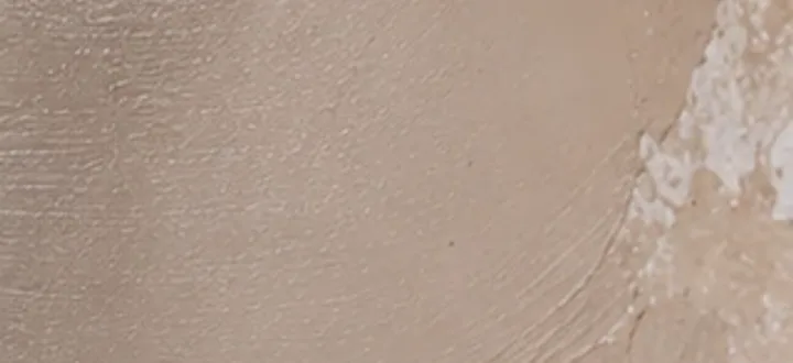 Close-up of a freshly skimmed plaster wall
